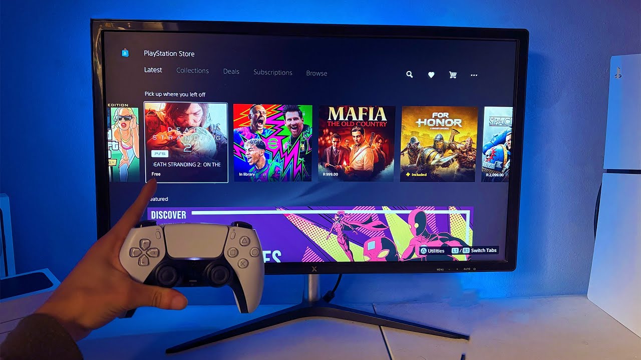 PlayStation 5 console with DualSense controller and PSN Store interface on the TV screen