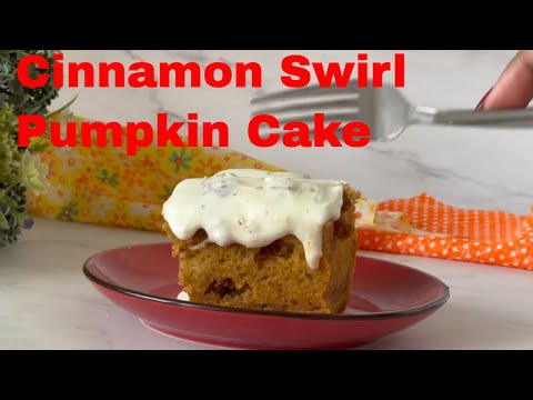 Delicious Cinnamon Swirl Pumpkin Cake Topped With Creamy Cream Cheese Glaze