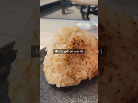 Grilled onigiri (rice ball) with soy sauce, mirin, sesame oil and dashi