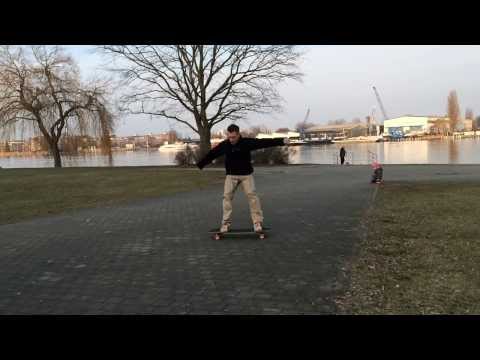 Longboarding: Slo-Mo Trick Tips - 180° Slide | How to Stand Up Slide