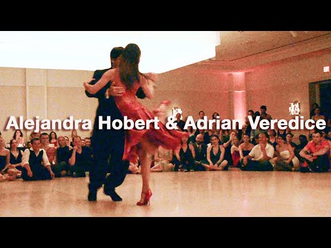  Alejandra Hobert  and  Adrian Veredice  are  dancing  to  the  milonga  "  Carnavalera  "  by  Juan D'Arienzo  at  Chicago Tango Week  in  2013
