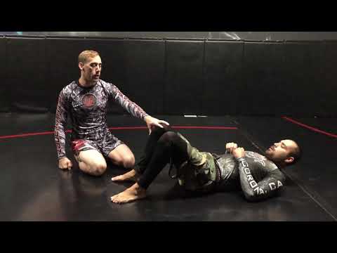 Jeremy Fields shows a No hand pass from half guard .