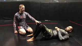 Jeremy Fields shows a No hand pass from half guard .