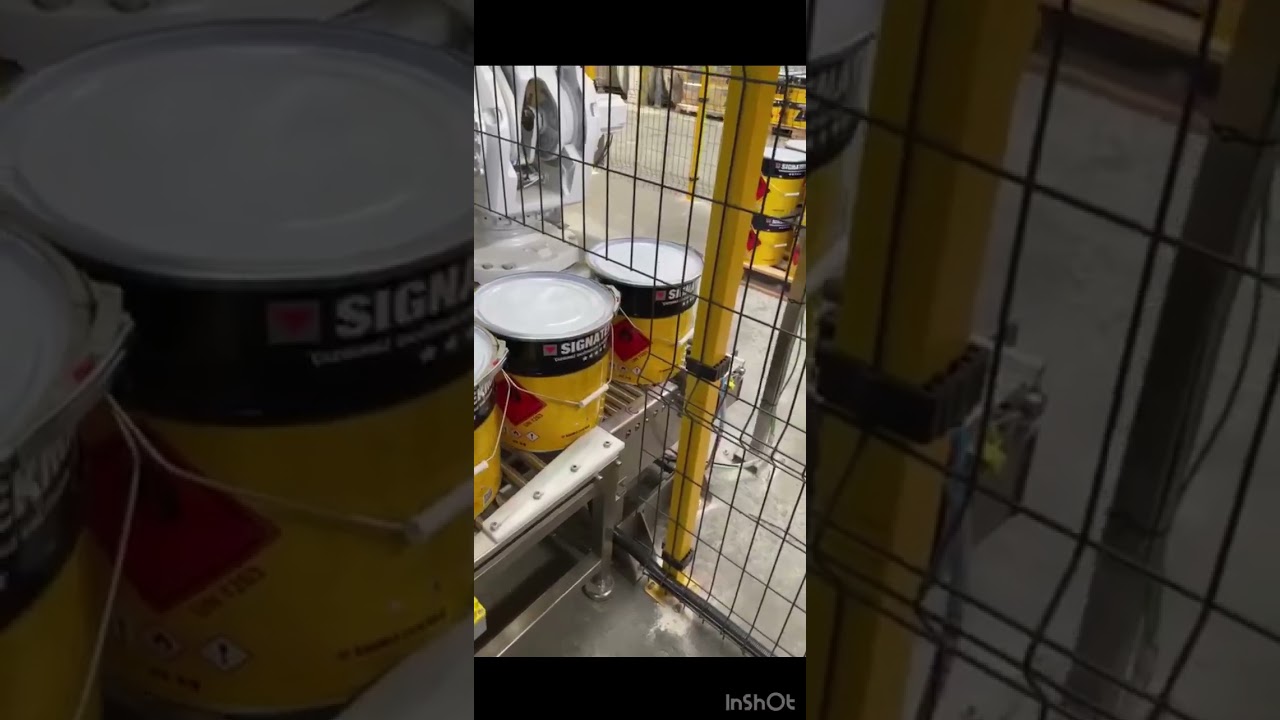 KULP GÖRME VE PALETE DİZME SİSTEMLİ TENEKE DOLUM HATTI