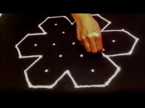 7 x 4 Interlaced dot rangoli design step by step | रंगोली | easy rangoli design by Gauri Video