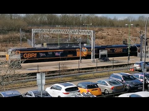 GBRF 66771 Drags 69001 through Milton Keynes enroute to Longport on 7/3/22