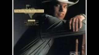 George Strait - I Know She Still Loves Me.