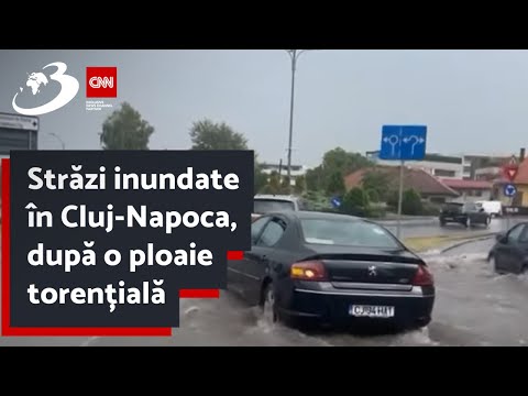 Străzi inundate în Cluj-Napoca, după o ploaie torențială