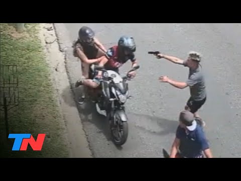 They tried to steal a police officer's motorcycle and ran away.