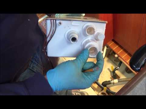 Replacing a shower sump system on S/V Bay Poet