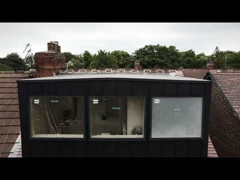 Dormer Loft Conversion with zinc cladding and new Rosemary tiled roof