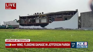 EF1 tornado damages Metairie building as Kenner floodwater stalls cars