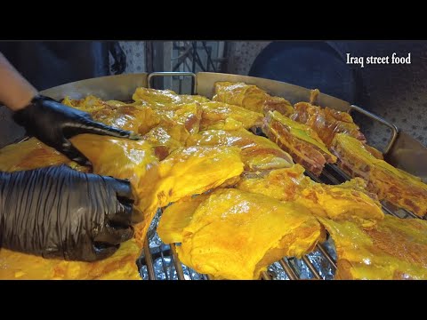Iraqi food grilled whole lamb underground in street food