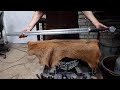 Forging a pattern welded long sword, the complete movie.