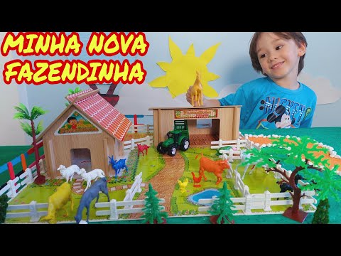 Fazendinha de brinquedo do Felipe  | Cavalo Boi Trator cabra ovelha| Som dos animais. Toy farm
