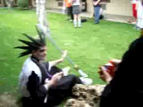 Orihime throws Cheez-its to Kenpachi