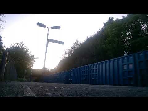 class 66 passing through pemberton with the bins