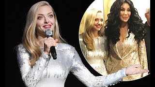 Amanda Seyfried glams up to introduce her Mamma Mia co-star Cher at CinemaCon in Las Vegas