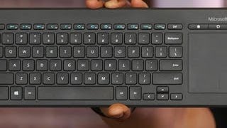 Video thumbnail for Microsoft All-in-One Media keyboard: A low-cost keyboard combo for home theater or home office by CNET
