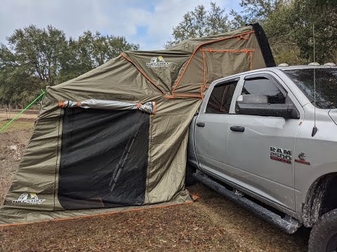 Families first night camping in a Tuff Stuff Overland rooftop tent with annex room.