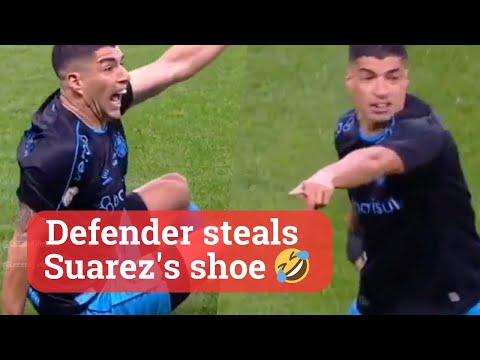 Suarez's explosive reaction when the defender steals his shoe