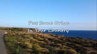 Travis Tritt - Put Some Drive In Your Country (with lyrics)