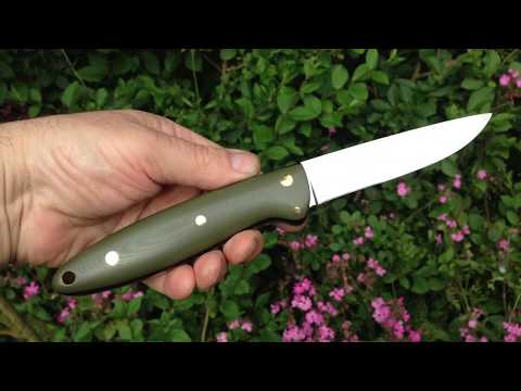 Bushcarver S3P in TAKEFU Special Gold2 steel. G10 scales with brass hardware.