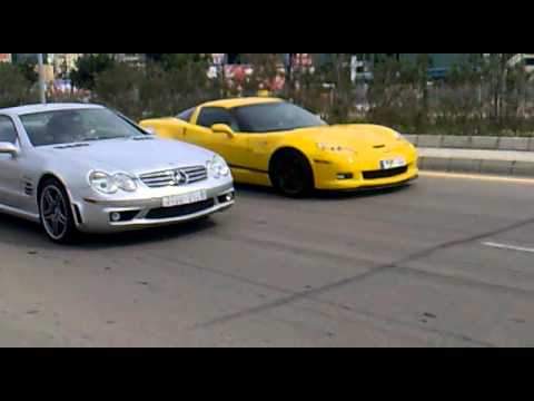 Top Gear : Corvette Z06  vs SL 65 AMG  ( 1/4 mile Drag race )