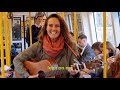 Brave woman inspires train sing along