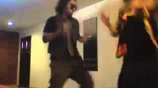 Dancing fools grooving to The Chicken Payback by A Band of Bees