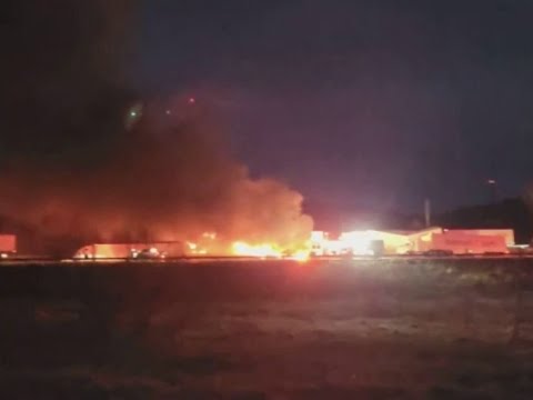 Fire Breaks Out After Semi-Trucks Involved in 'Massive Crash' On Icy WI Interstate
