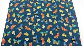 navy blue Lawn fabric by Cotton and Steel with butterflies