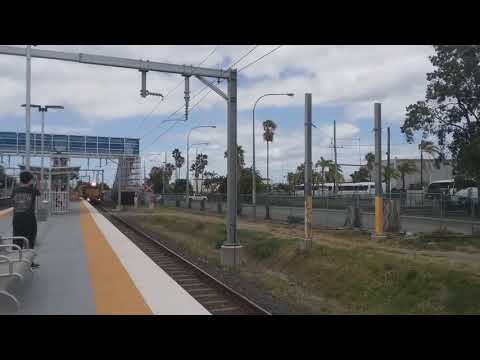 Aurizon's 2391, 2353 and 2801 pass Strathpine Station with #Y239 loaded Railset and empty spoiler