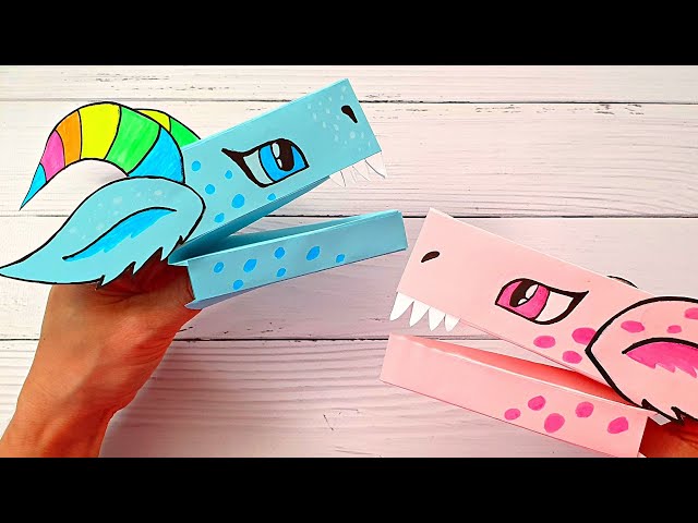 Vídeo relacionado con Baker Ross- Kits de saltarines de dragones (Pack de 6) Juegos y accesorios para fiestas, manualidades para días lluviosos