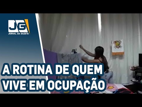 A dura rotina de quem mora em prédio invadido