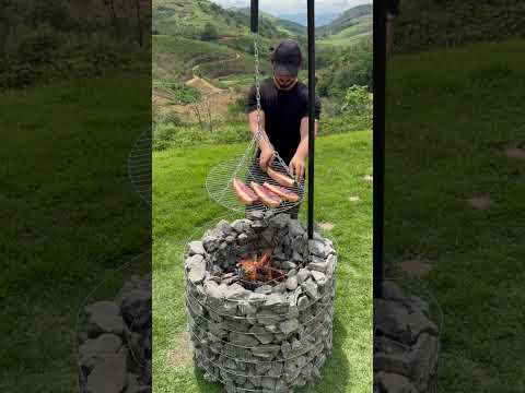 🔥 Built this adjustable BBQ pit with stone and wire .📘 Manual (PDF) — link in bio