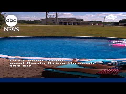 Dust devil sends pool floats flying