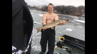 spearing northern pike with a guy  addicted to the hole  but  momma  Says no to shirtless charters