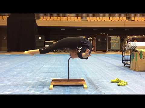 Standing on teeth handbalance contortion Anastasia Trushina