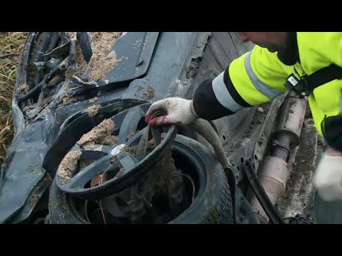 A rollover car is stuck in a deep ditch! #Road_Assistance