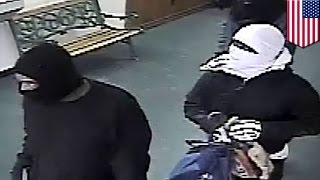 Check-cashing robbery video: gunmen caught sticking up Houston businesses on surveillance