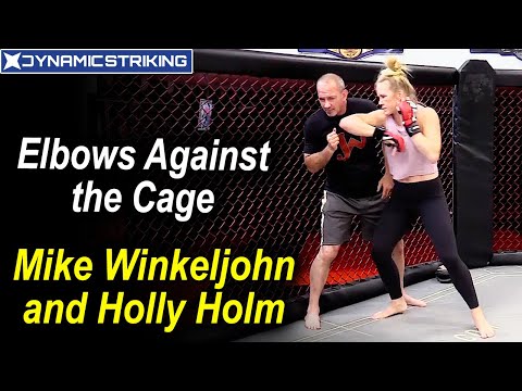 Elbows against the Cage by Mike Winkeljohn and Holly Holm