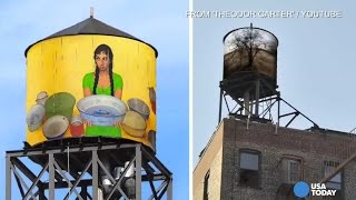 Art gets wrapped around NYC water tanks  ZoomIN