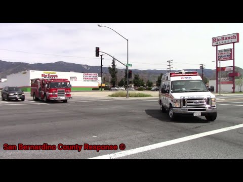 San Bernardino County Fire Department 227 & AMR. Arriving On Scene Of A Traffic Collision Code 3
