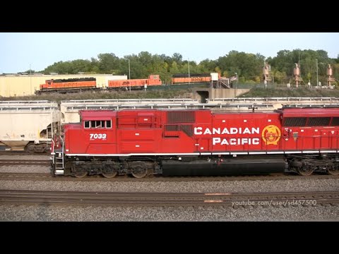 New SD70ACU on CP 493 at BNSF's Northtown Yard -Huge cut of Soo Line hoppers-