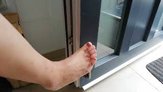 Dverná zarážka výklopná 125mm, zelená