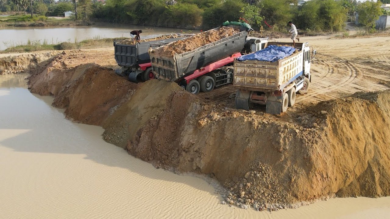 Wow! Deeply And Higher Landfilling Into Huge Pond By KOMATSU DOZER Operated With Dump Trucks Team