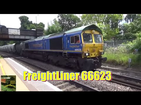 FreightLiner 66623 Bill Bolsover Hauls a Rake of Cement Tankers Through Water Orton