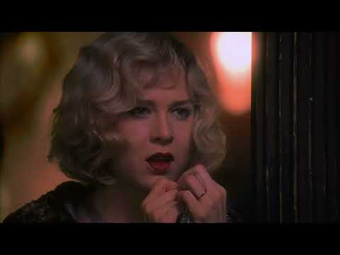 Fourth trailer still with spotlight and marquee letters, mirroring the finale 'Nowadays/Hot Honey Rag'