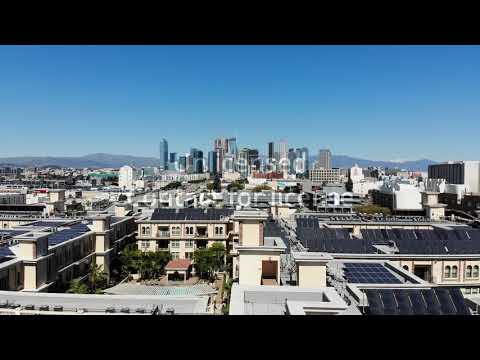 4K Lorenzo Apartments Downtown Los Angeles City Noon Aerial Pan Up